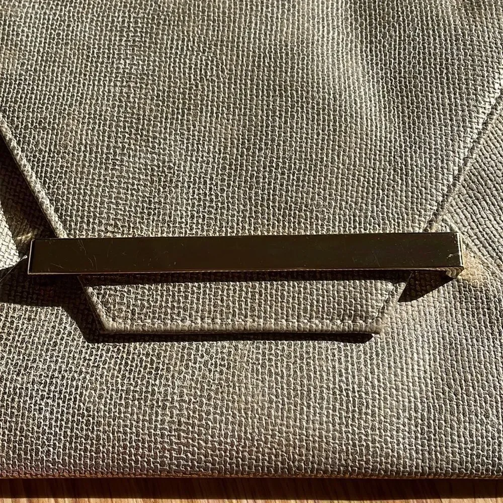 Faux woven straw gold bar brushed gold envelope clutch.